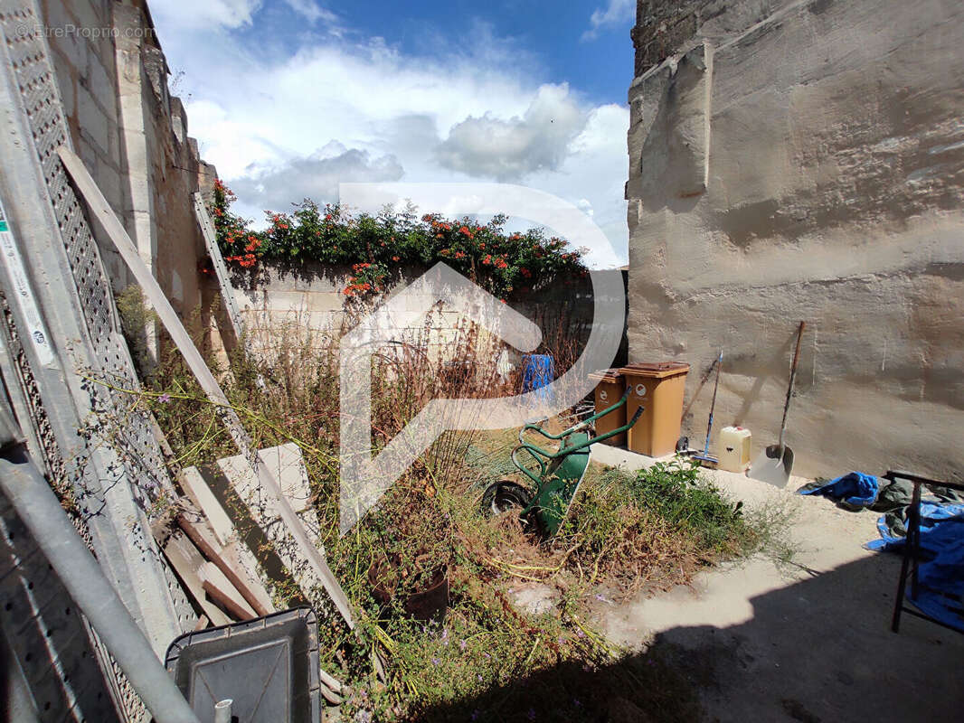 Maison de ville en pierre au coeur de Galgon - photo 7
