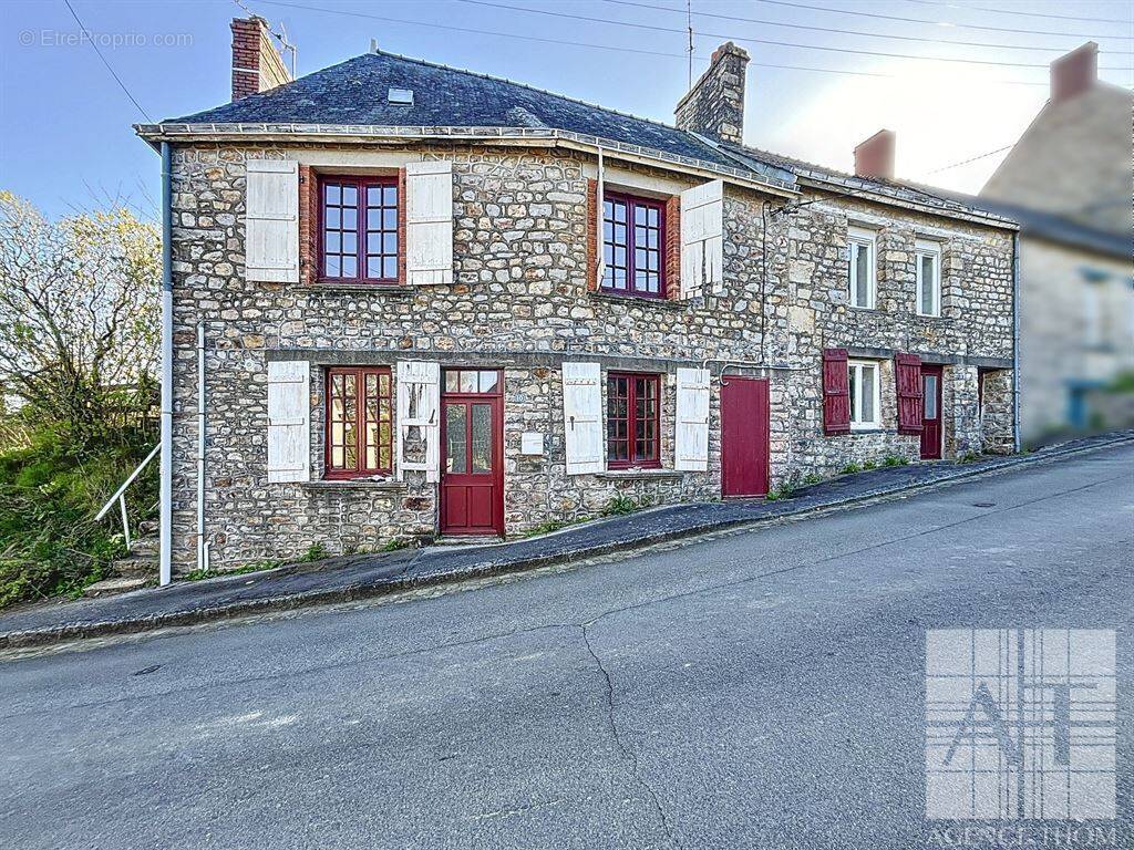 Maison à JUVIGNE