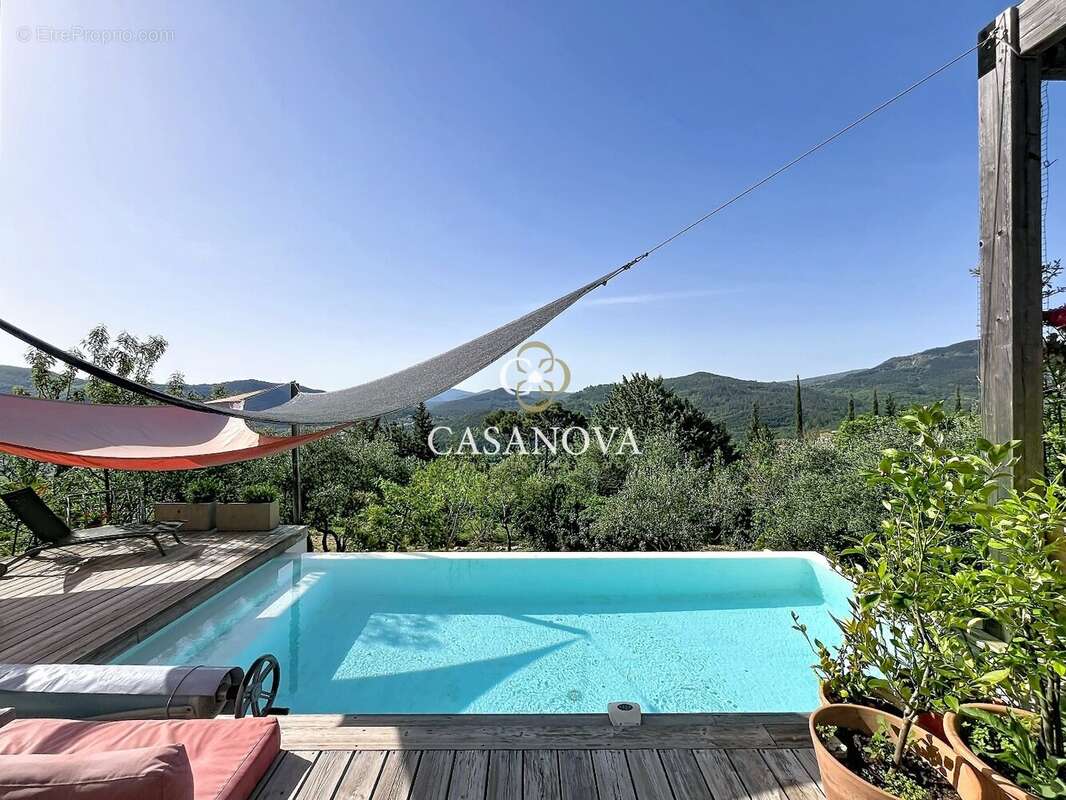 Villa d'architecte contemporaine avec piscine à débordement chauffée et vue panoramique exceptionnelle sur les hauteurs de Lodèv - photo 8