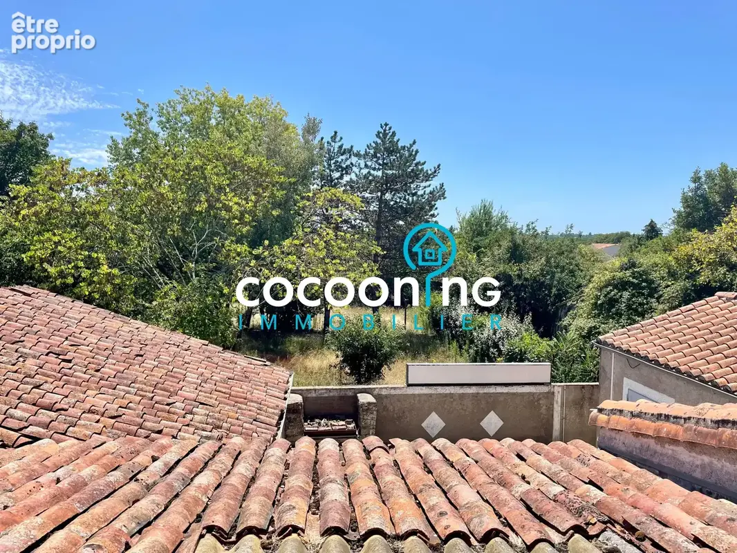 Maison en plein coeur de bourg - photo 10