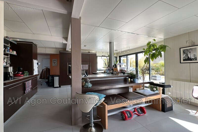 Maison à AGON-COUTAINVILLE