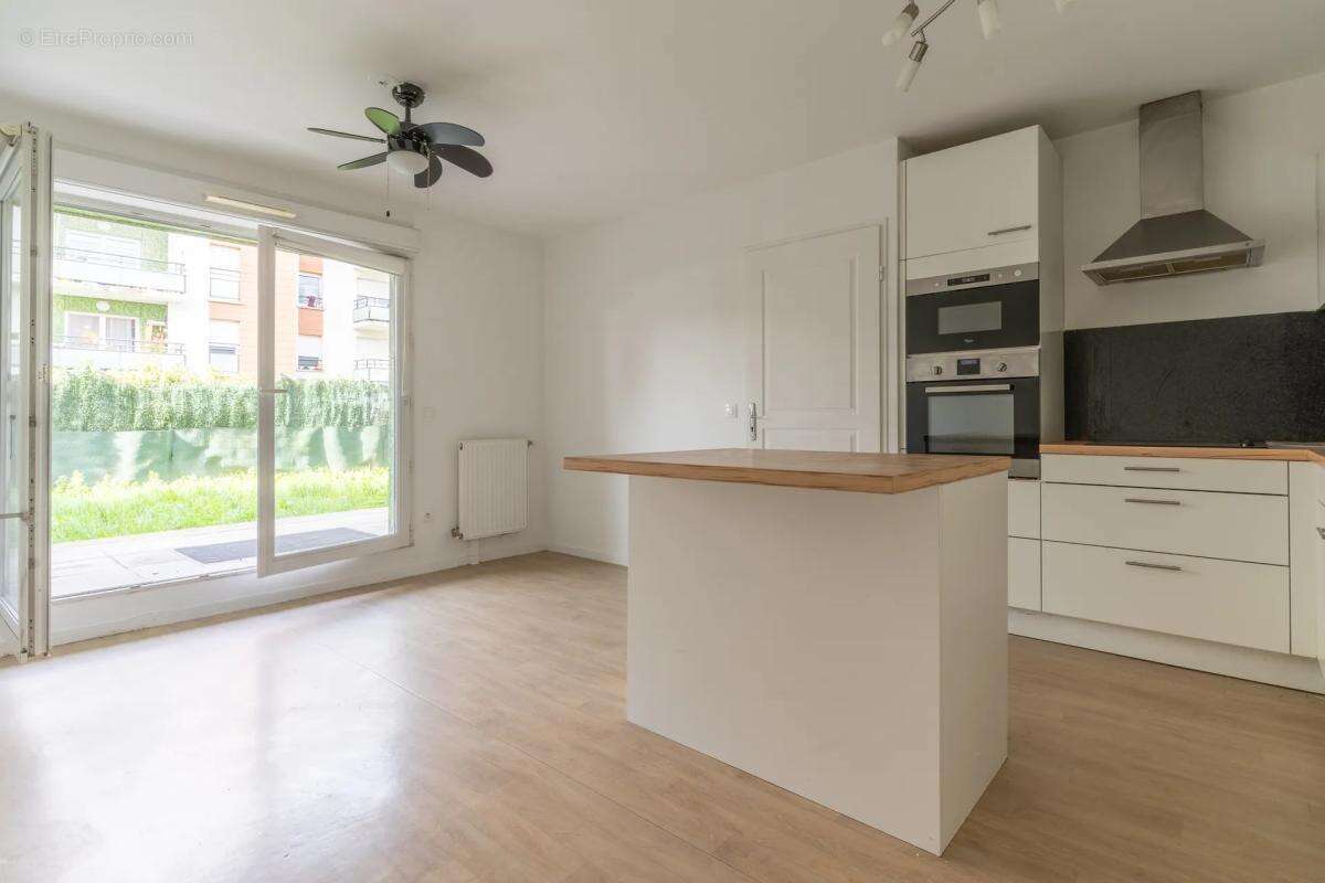 Appartement 2 pièces avec jardin à Mantes-la-Jolie - photo 3