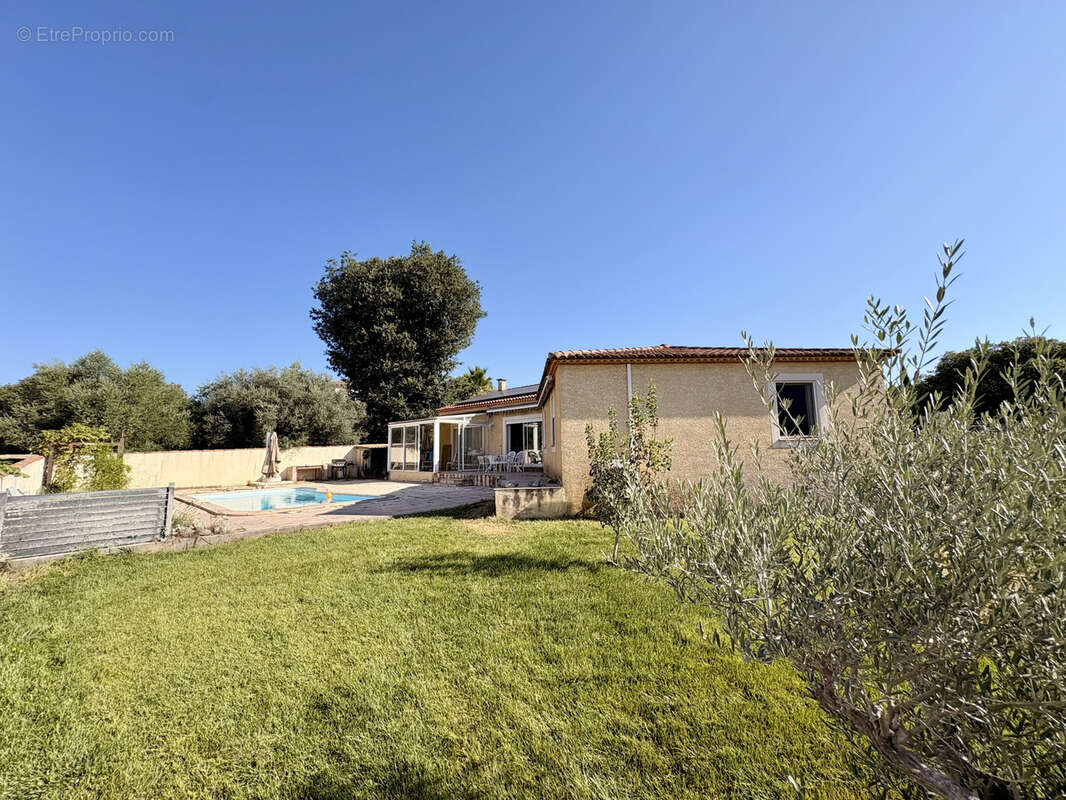 Maison plain pied 130m2 + double garage et piscine - UCHAUD - - photo 11