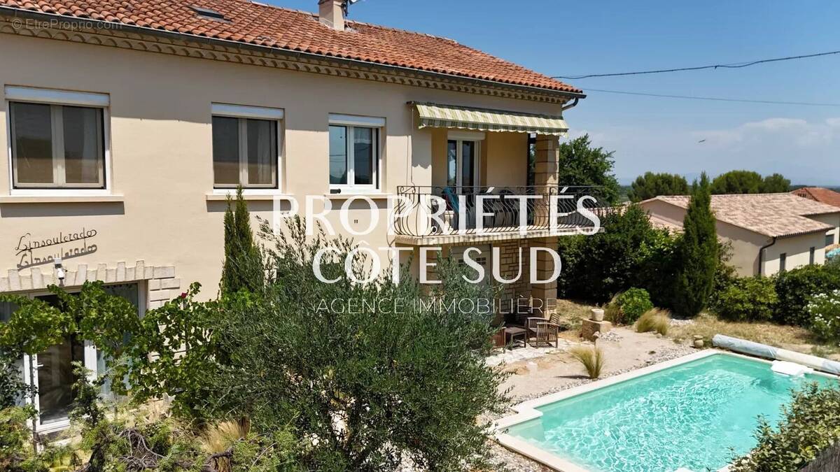 Maison à LAUDUN-L'ARDOISE