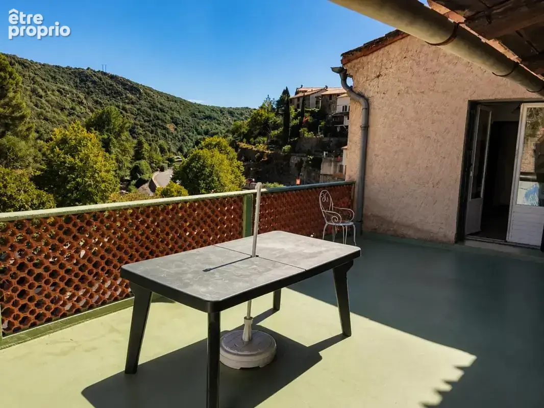 Maison de 5 pièces de 126 m² à Lastours avec terrasse et jardinet.
Vue panoramique - photo 2