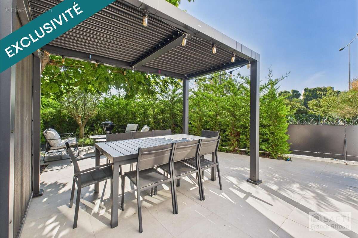 Photo 2 - Maison à COURBEVOIE