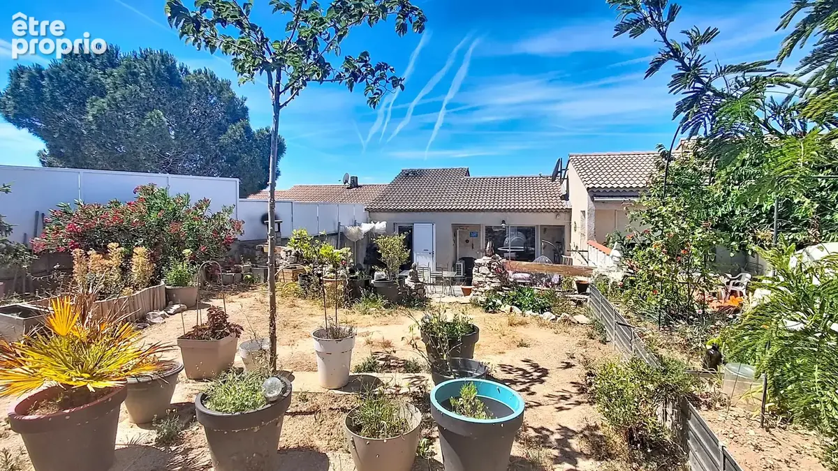 Maison type 4 mitoyenne avec jardin ,garage et 1 place de parking privative - photo 4