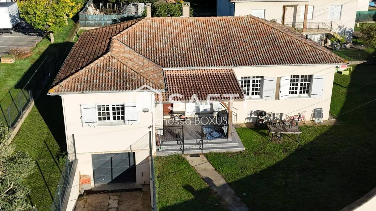 Photo 1 - Maison à AIGUILLON