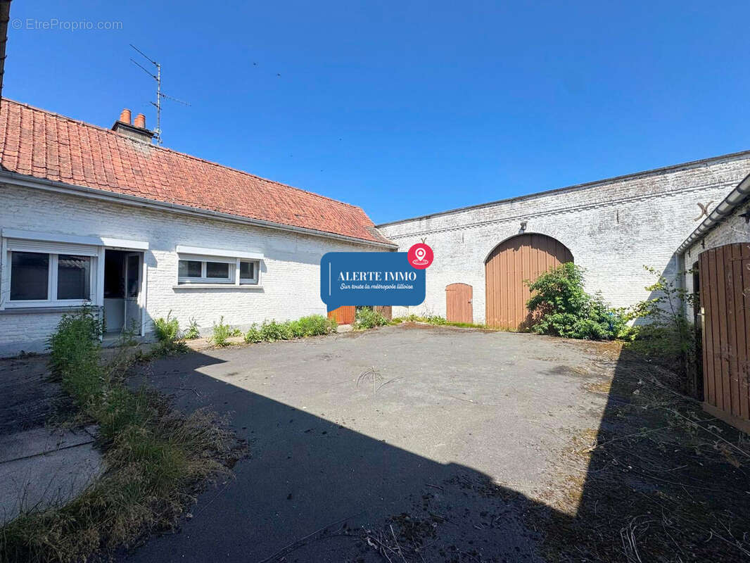 Maison à LA NEUVILLE