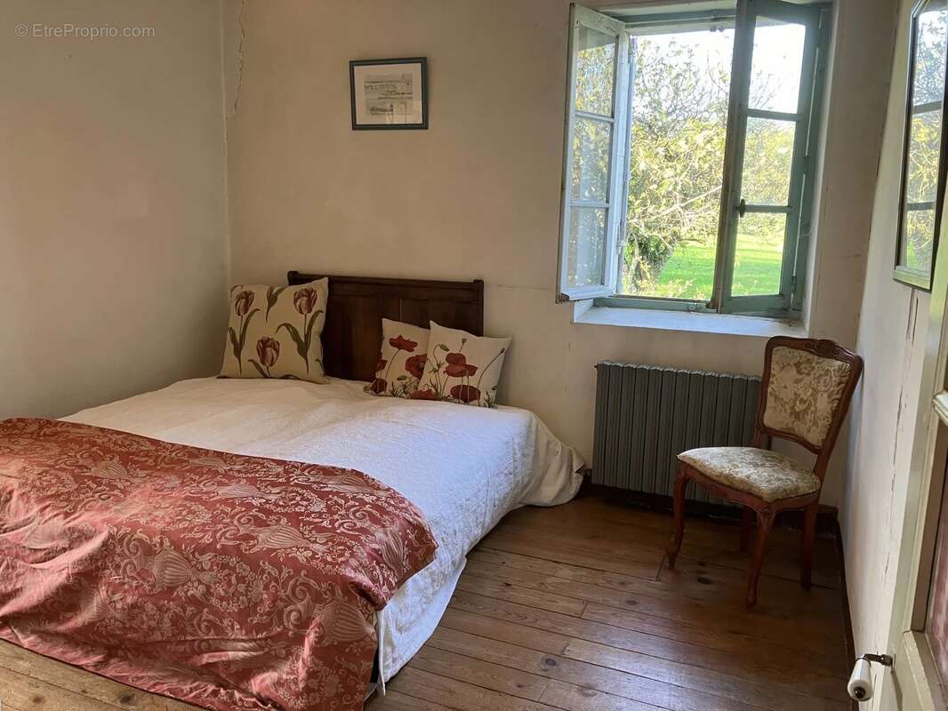 Maison de campagne avec un grand potentiel dans un hameau tranquille - photo 7