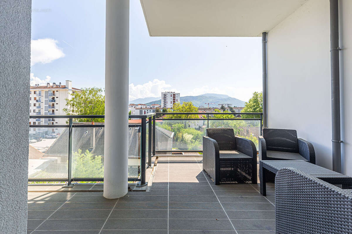 Agence immobiliere laforet - exclusivite - "lotus" - annecy - appartement traversant t4 de 81,93m² - cellier - garage en option  - photo 7