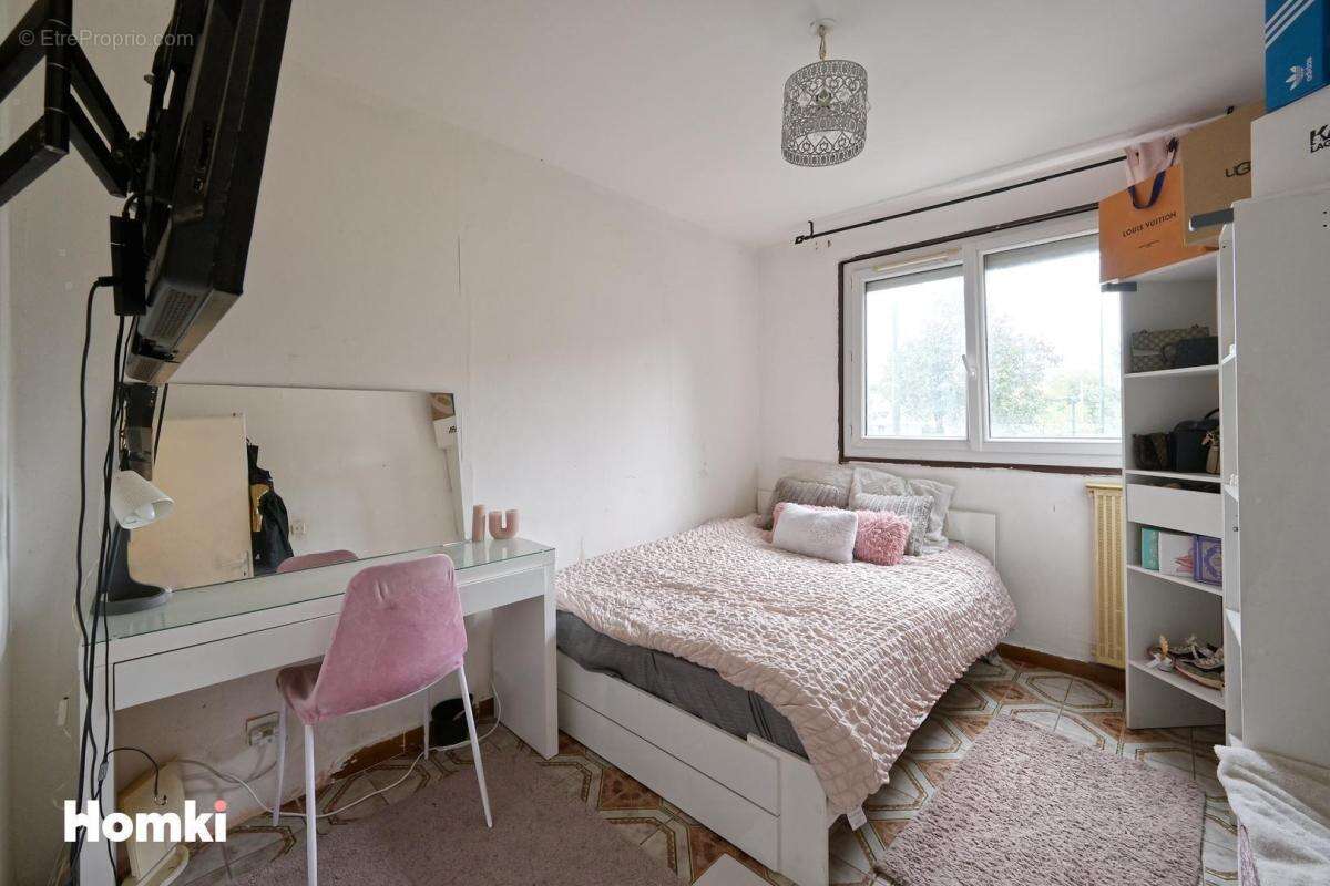 Appartement T4 de 88 m2 à Échirolles 38130, Place Beaumarchais - photo 5