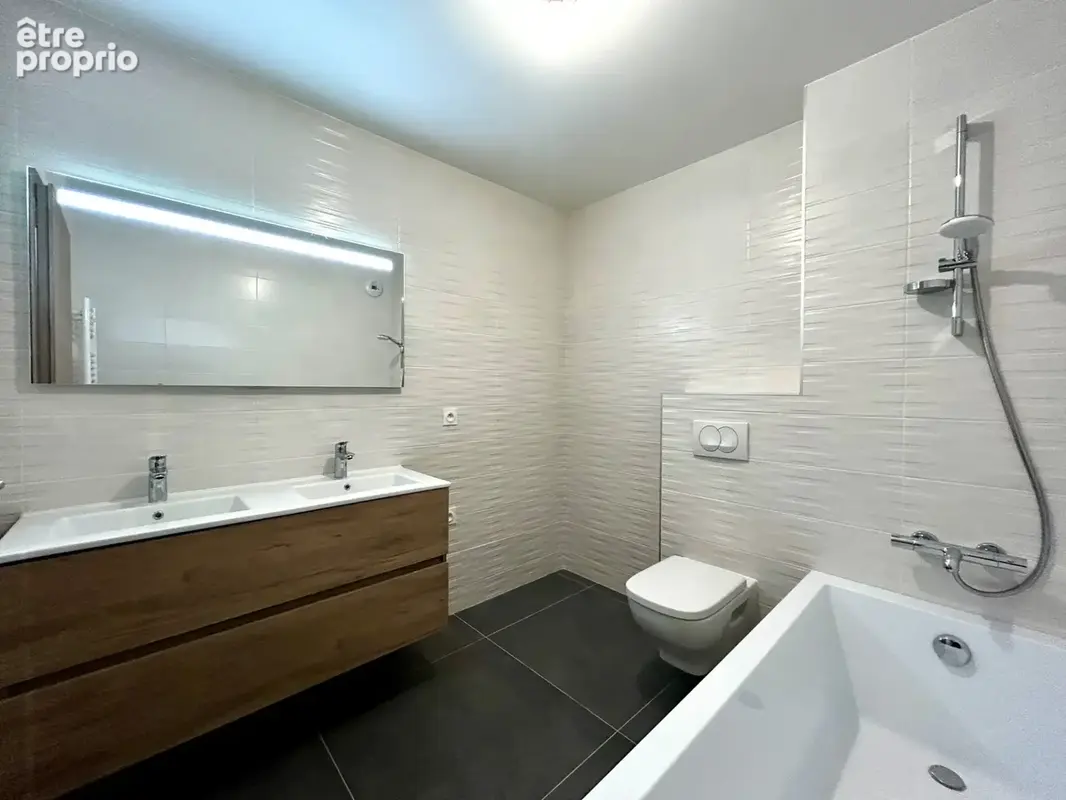 À vendre – Appartement T2 en rez-de-jardin avec terrasse et jardin à Ambilly (74) - photo 3