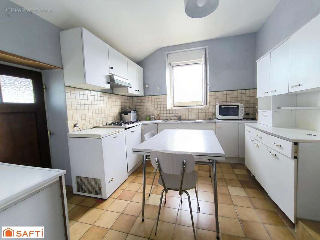 Photo 5 - Maison à GUERLESQUIN