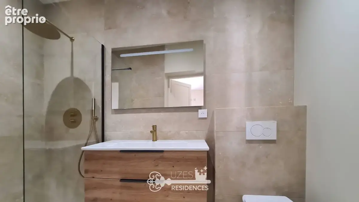 Appartement rénové de 130 m2 avec terrasse, dépendance et 3 chambres au cœur d'Uzès - photo 10