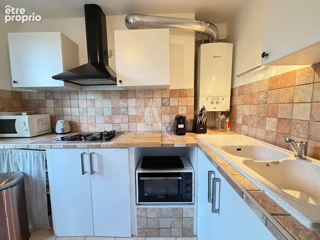 Appartement type 3/4 lumineux avec parking cave proche centre ville - photo 5