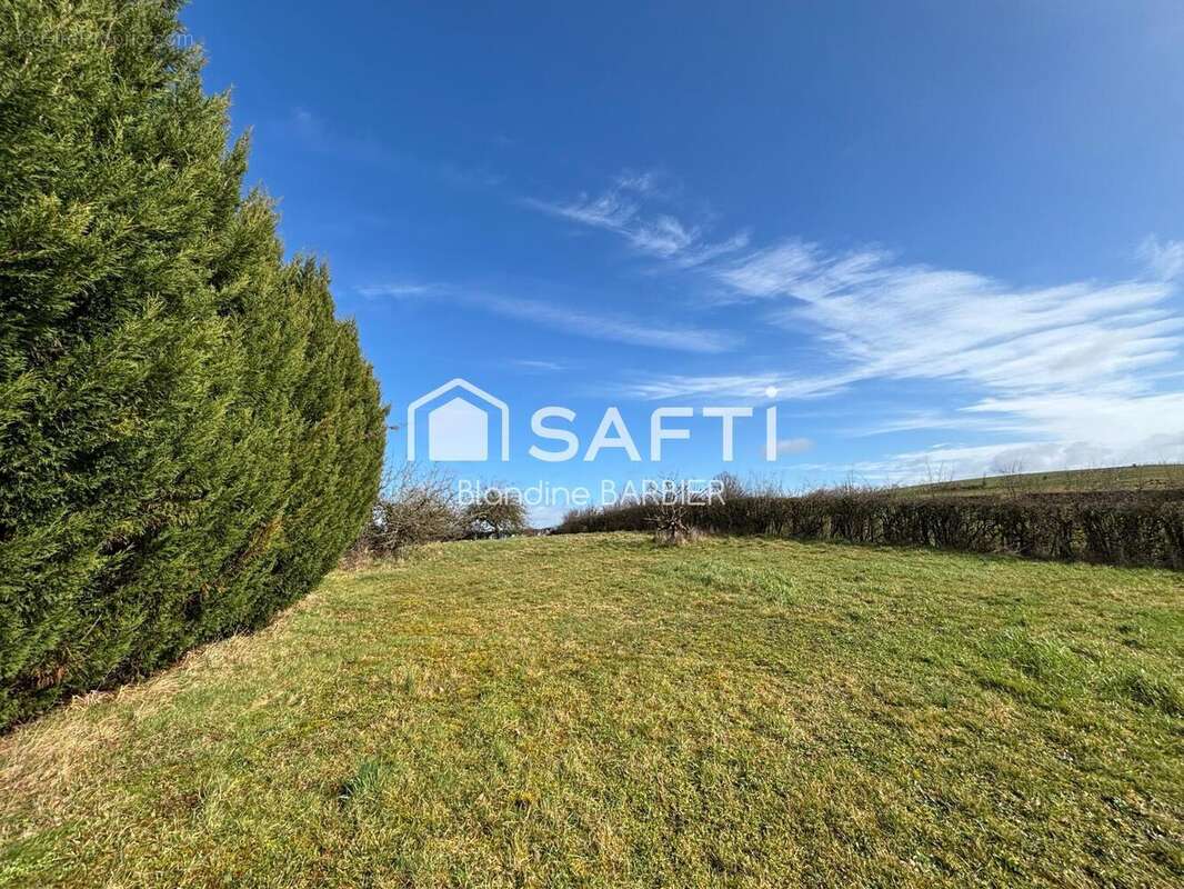 Photo 2 - Terrain à LE BREUIL
