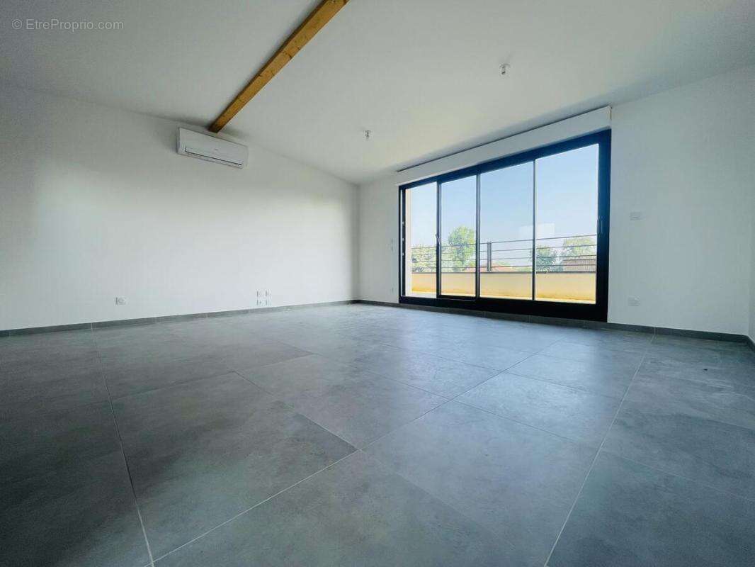 Appartement F3 - photo 2