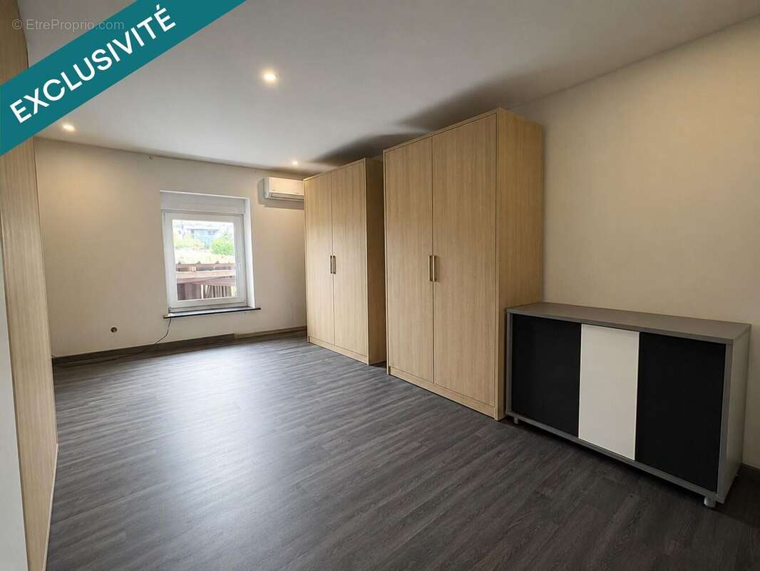 Maison 119 m² à Errouville  - photo 7