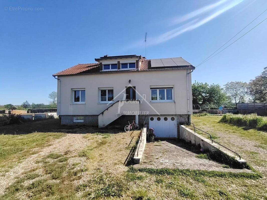 Maison à DIOU