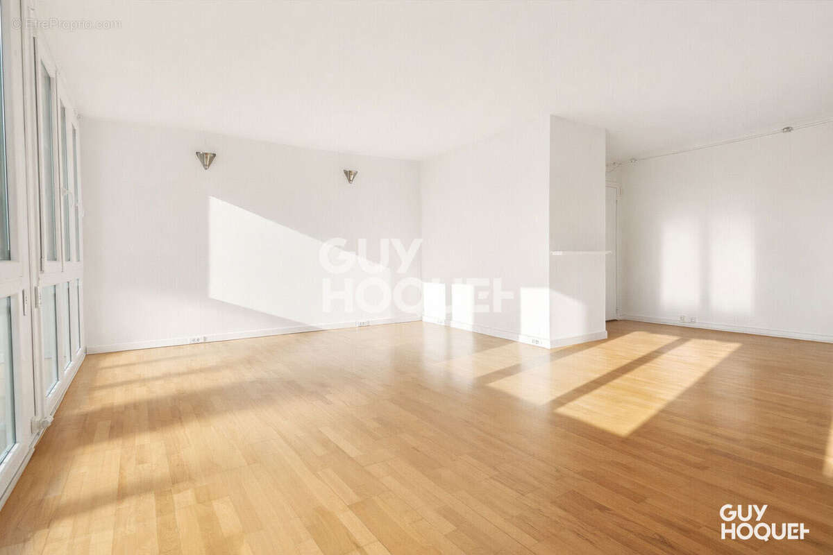 Appartement traversant de 85 m² + balcon - photo 2
