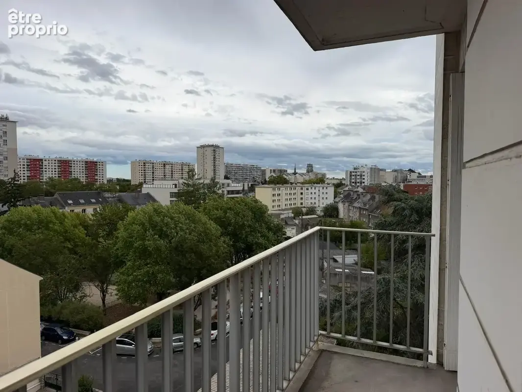 à Orléans : appartement 4 pièces avec 2 places parking et balcon traversant ascenceur - photo 4