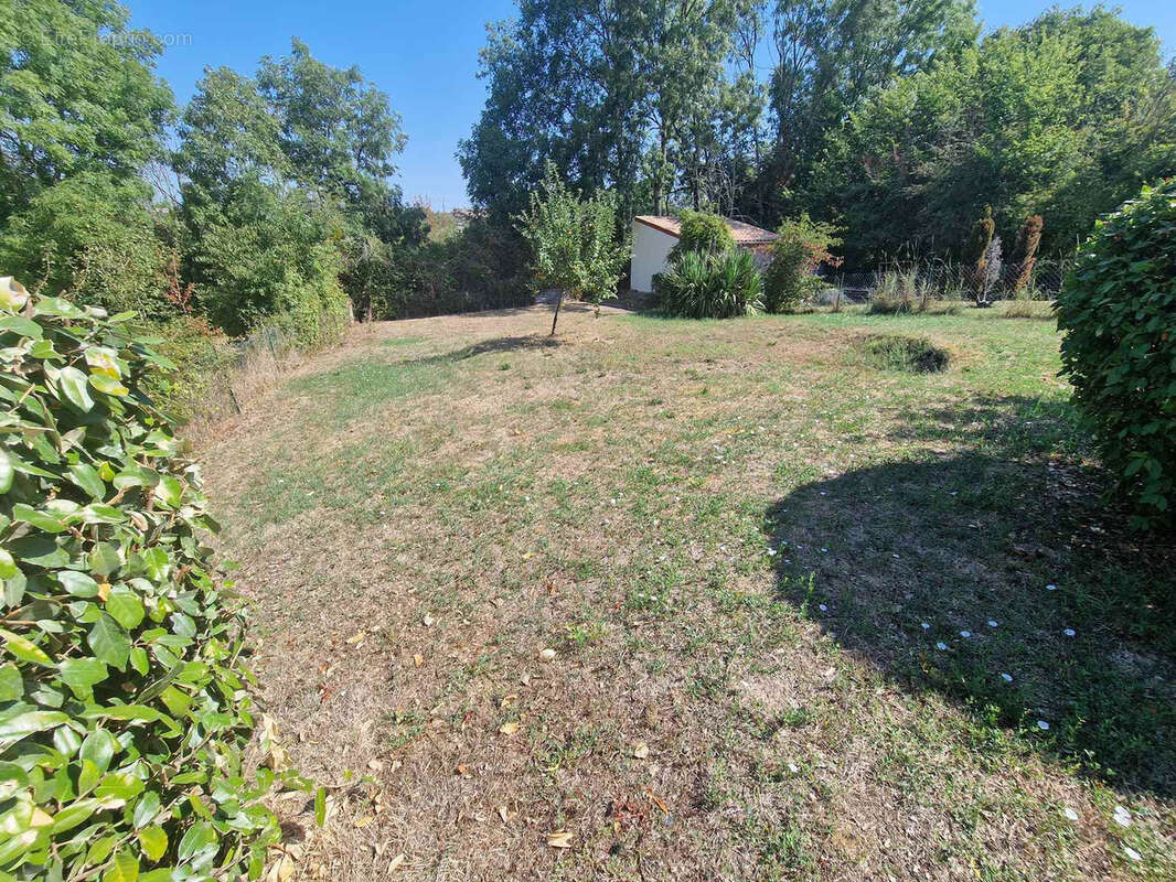Maison de plain-pied avec jardin et garage - photo 3