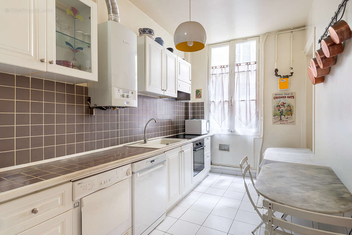 PARIS 10ème - 5 pièces de 114 m² (usage professionnel possible) - photo 4