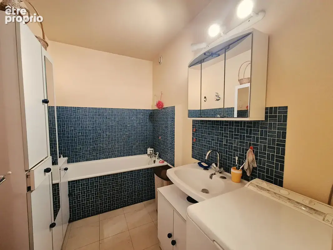 Appartement 3 pièces 69.90 m² au 7ème étage avec balcon et garage - photo 6
