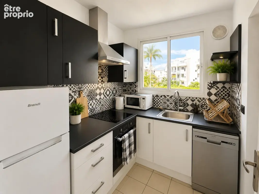 AppartementT2 de 49 m² avec grand garage de 33 m² Saint-Pierre centre - photo 7