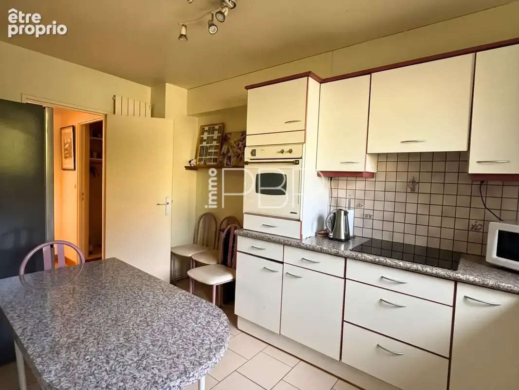 Appartement T4 avec box et cave - photo 5