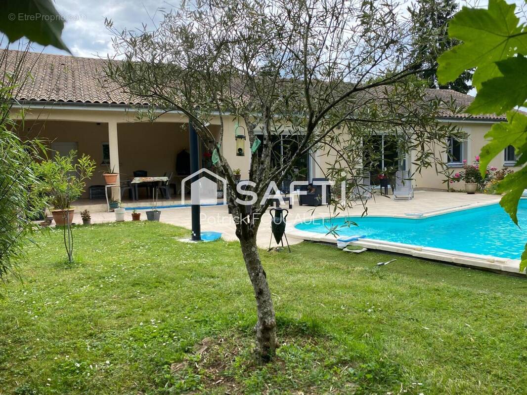 Photo 1 - Maison à MIGNE-AUXANCES