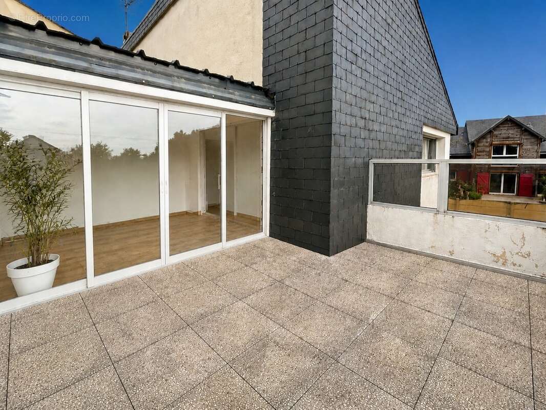Maison de ville de 106,9 M² avec bel espace de vie, 3 chambres, terrasse et véranda au cœur de Granville ! - photo 10