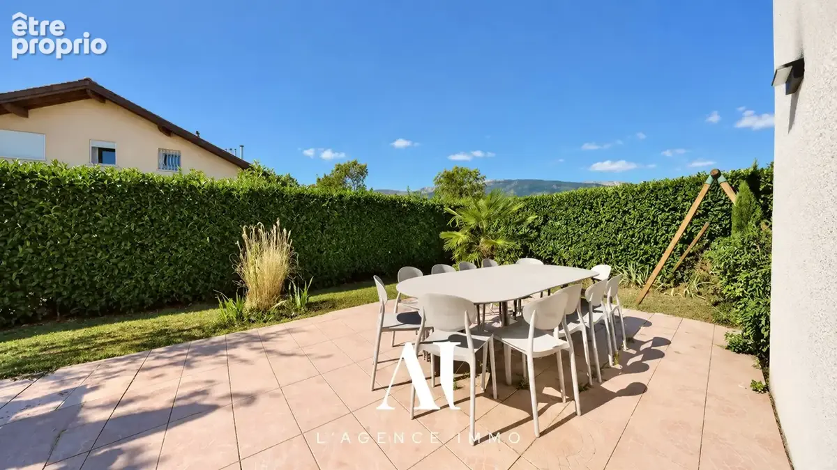 Maison 7 pièces 165 m² à vendre à Cessy (01170) - photo 7