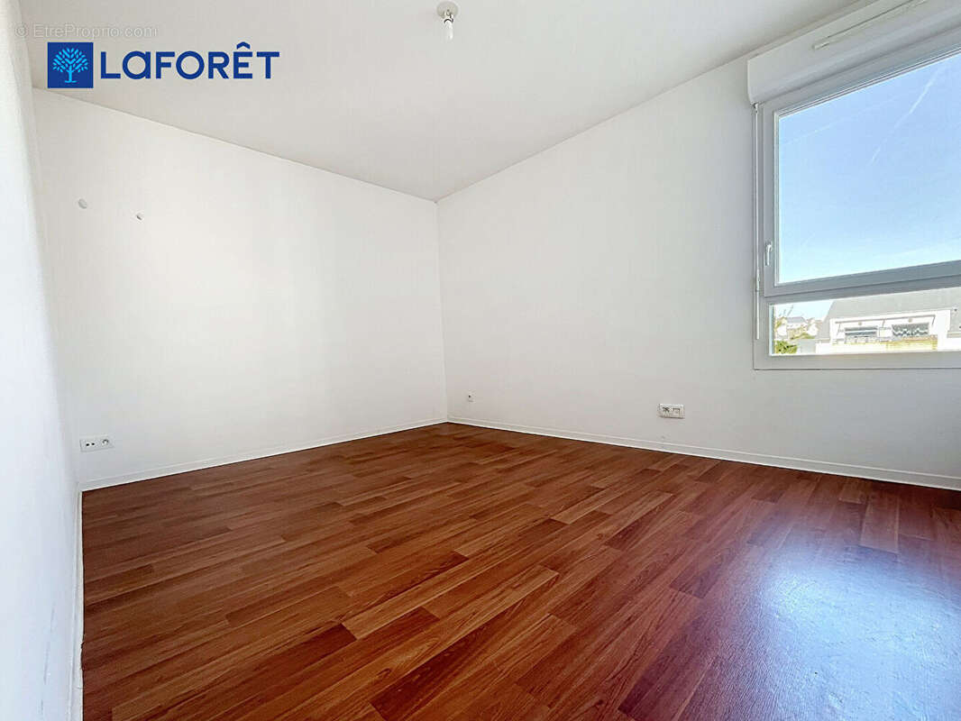 Au Centre de Guidel, Appartement 68m²,  2 chambres, terrasse, jardin, 2 stationnements - photo 9