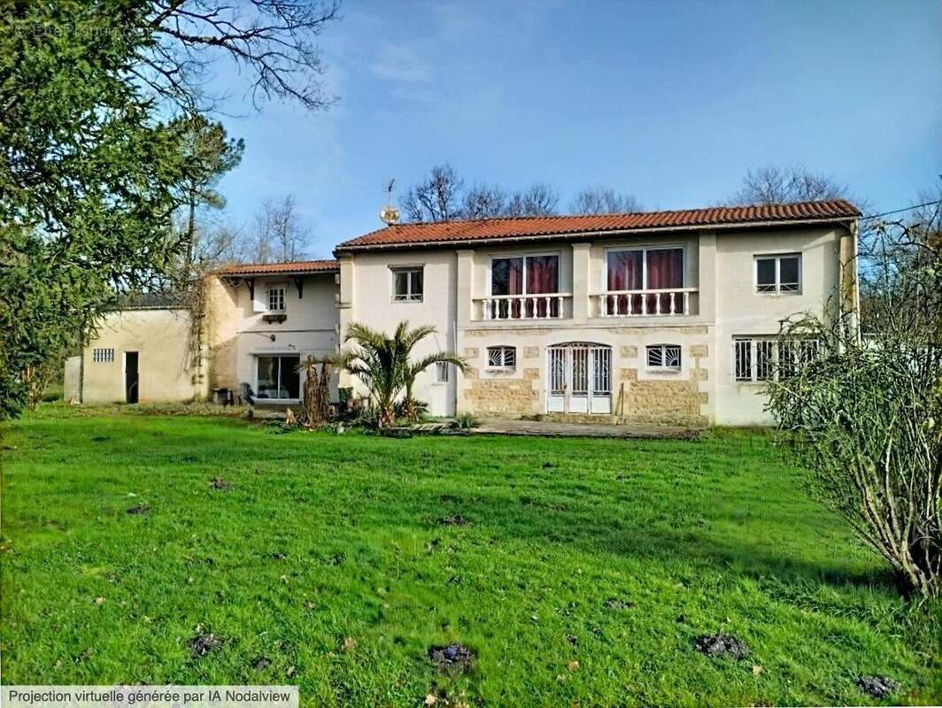 Photo 3 - Maison à REIGNAC