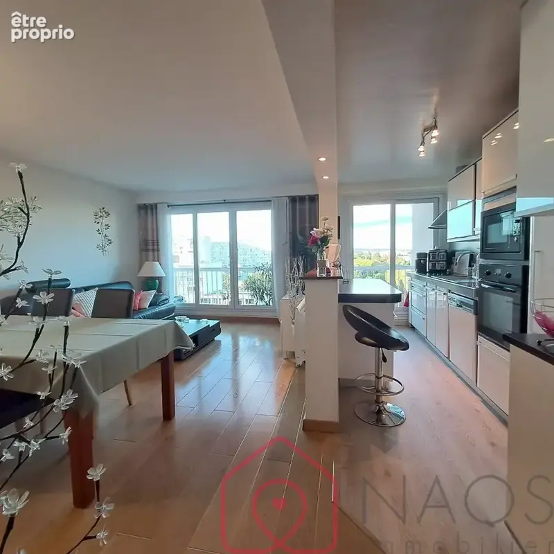 Appartement 3 pièces 57 m² à vendre à Villeneuve-La-Garenne (92390) - photo 2
