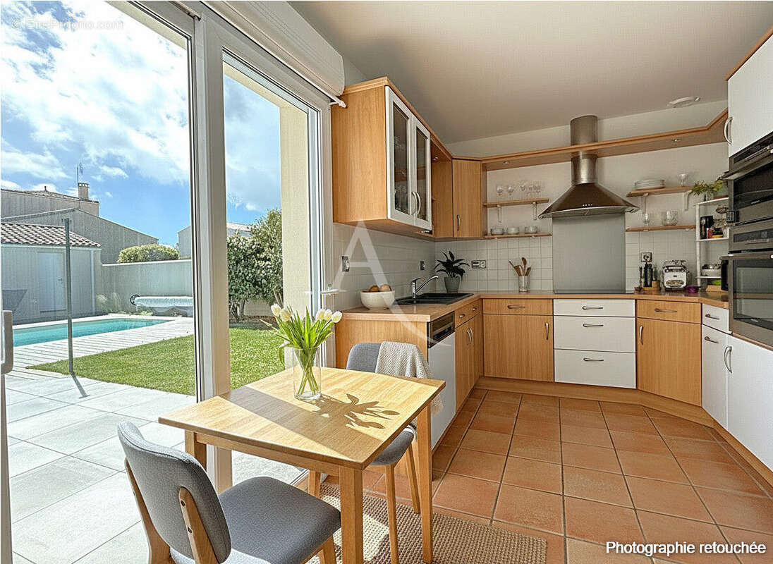PUILBOREAU  Maison de 142 m² - photo 7