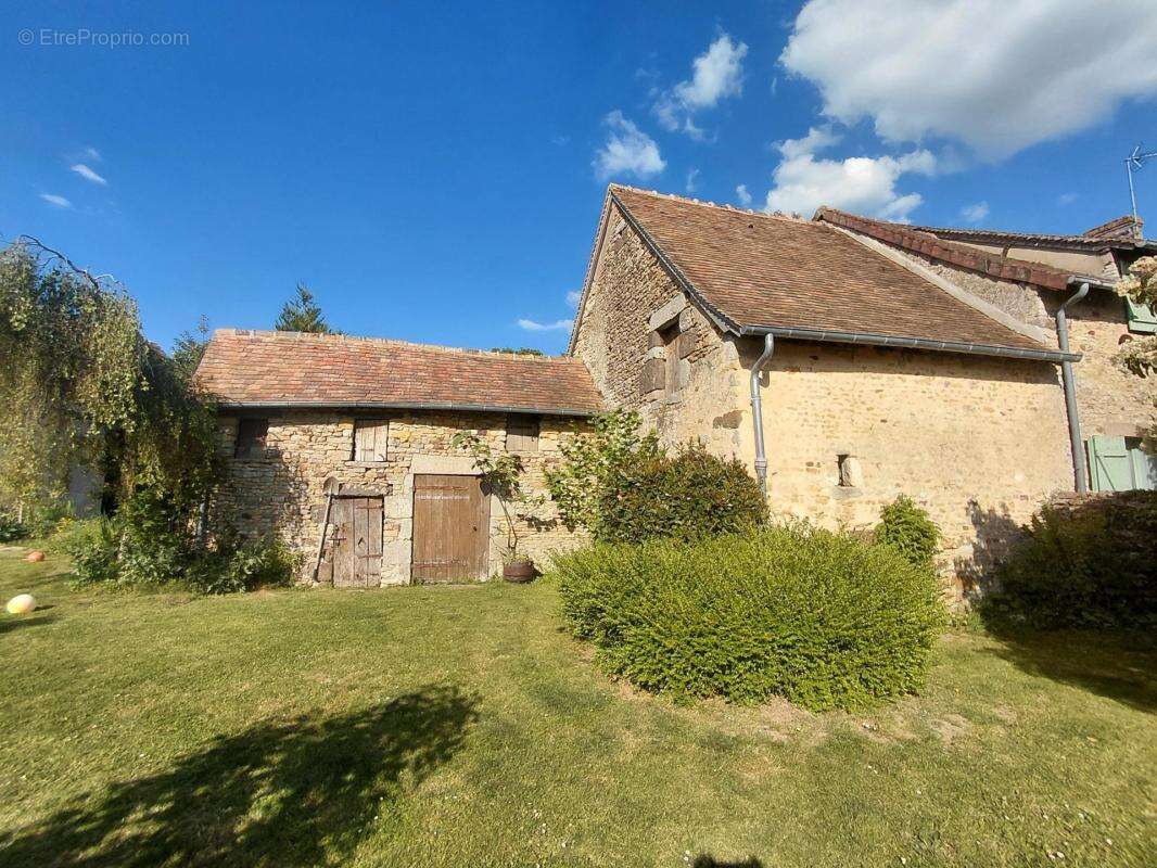 Maison à ARCONNAY