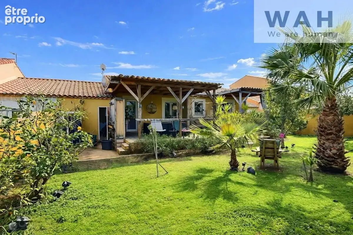 Maison de plain-pied 110 m2 avec jardin arboré et garage. - photo 4
