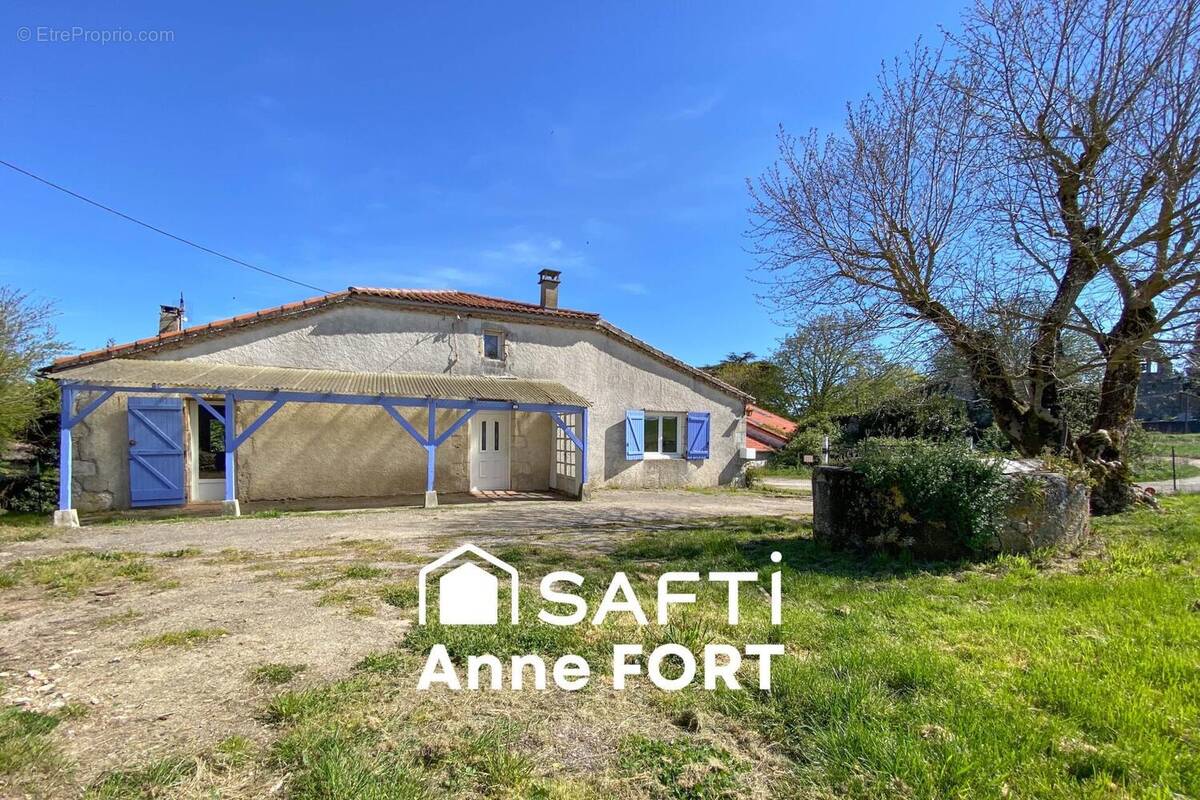 Photo 1 - Maison à LAROQUE-TIMBAUT