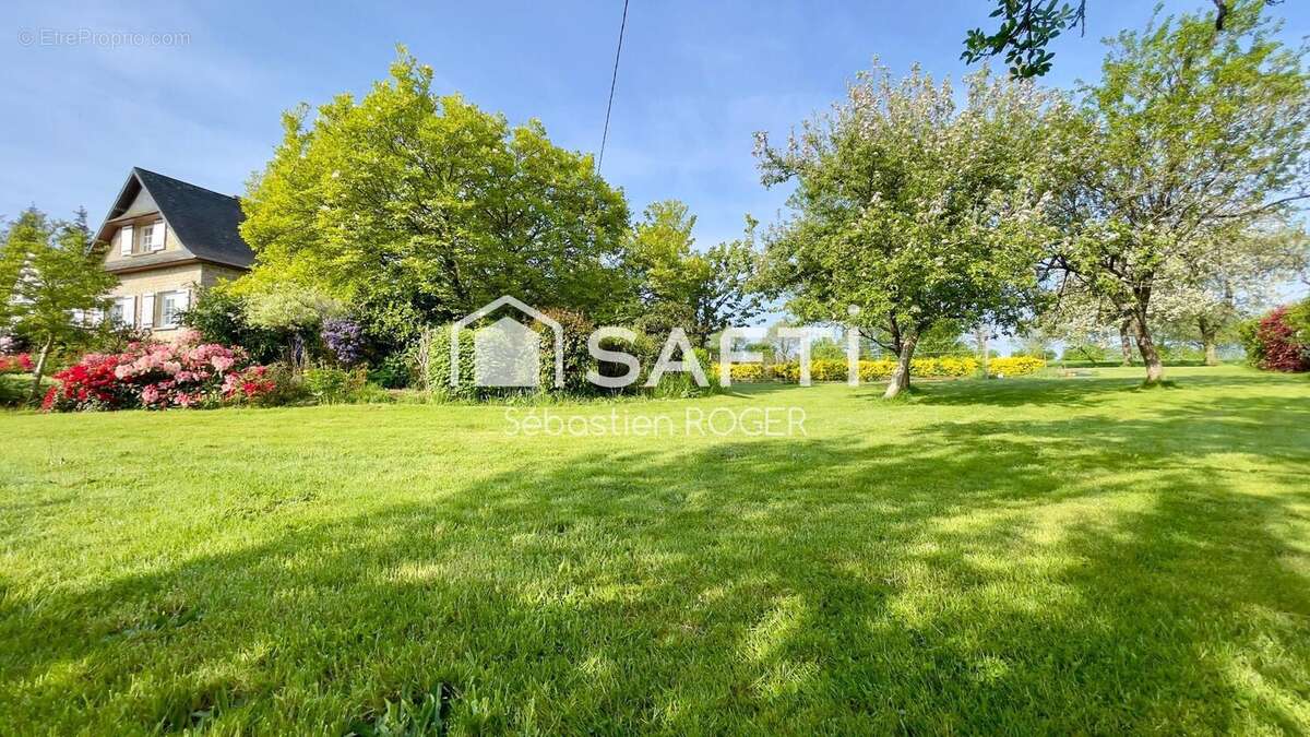 Photo 2 - Maison à SAINT-GEORGES-BUTTAVENT