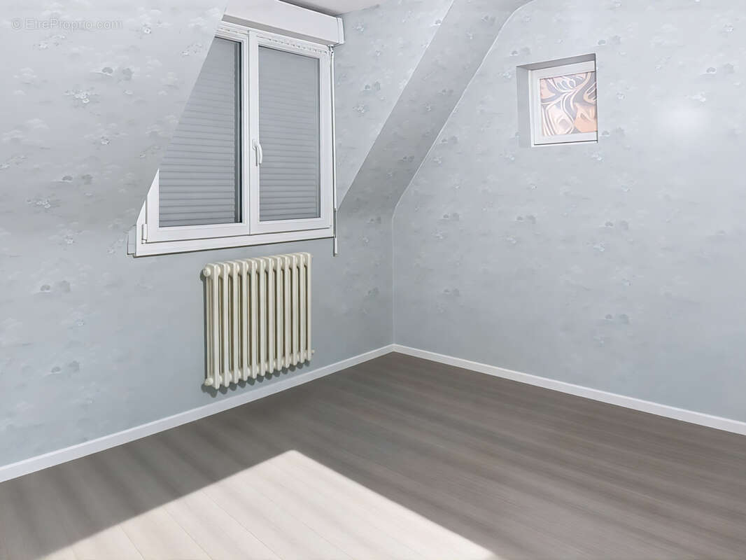 Maison à JUVIGNY-LE-TERTRE