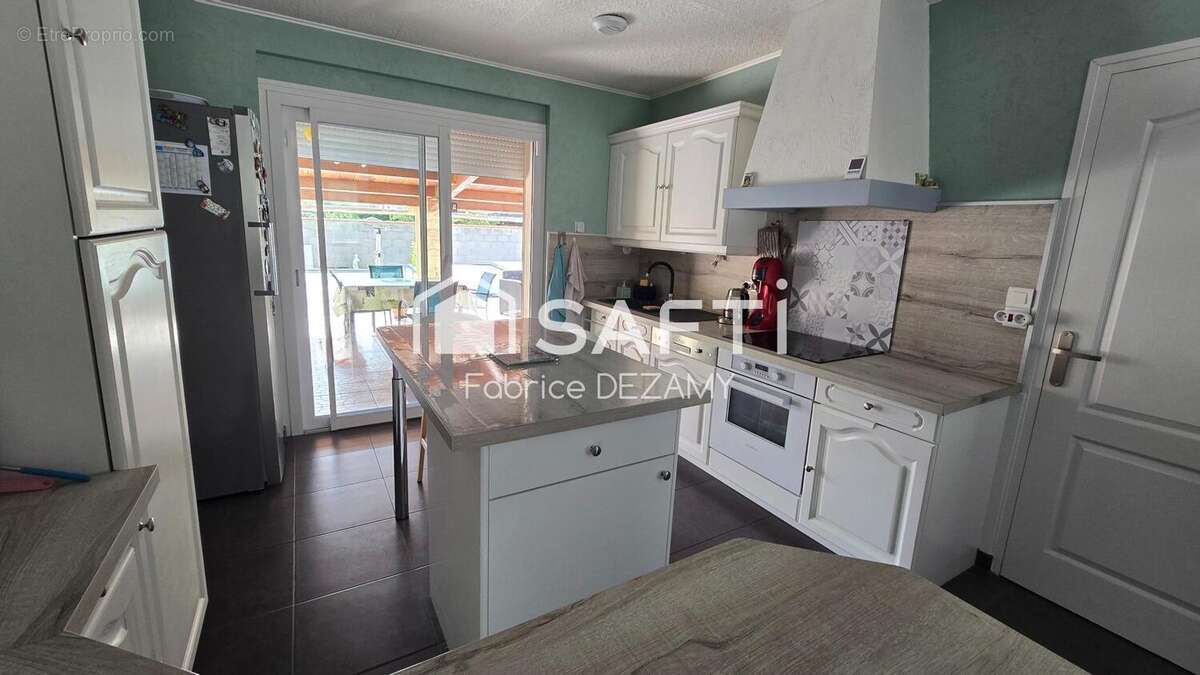 Photo 4 - Maison à SAINT-JEAN-DE-BEUGNE