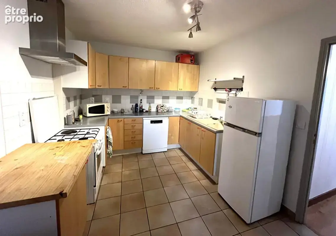 Immeuble avec local commercial et appartement  - Arinthod centre - photo 7