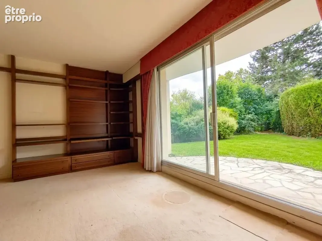 Appartement avec jardin privatif, caves et parking - photo 3