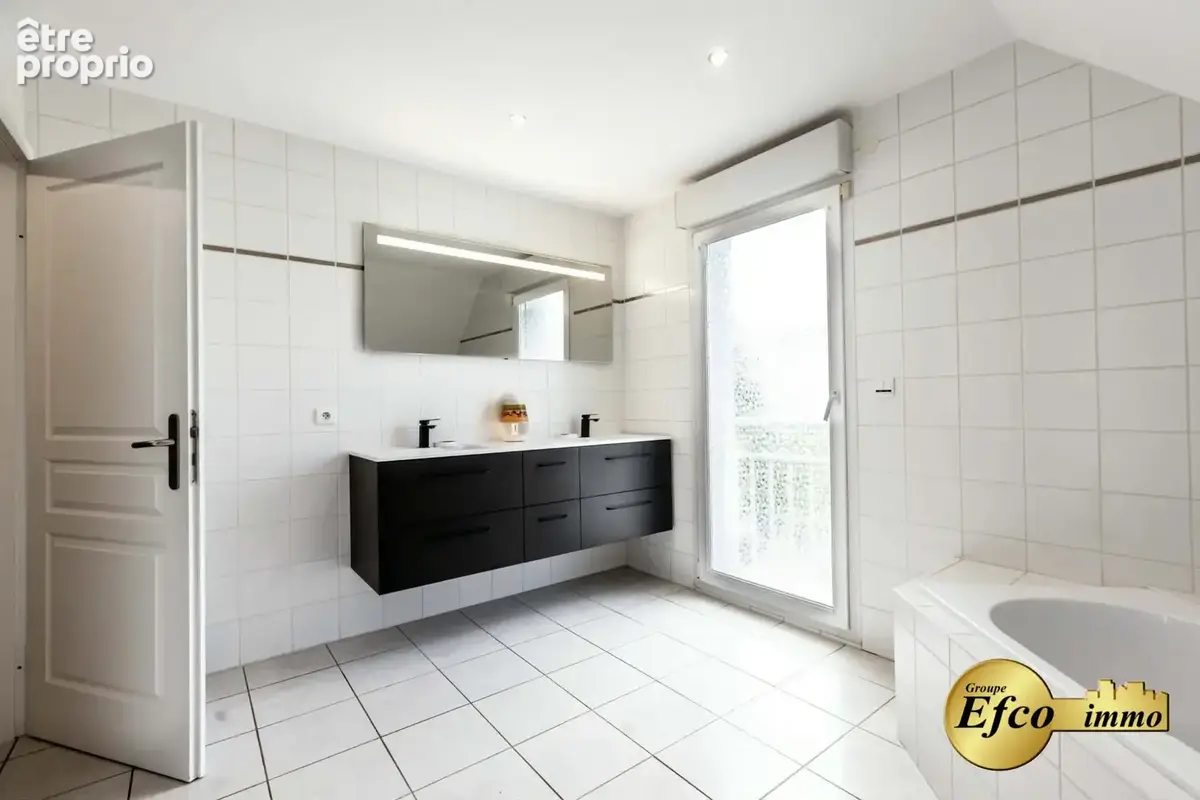 Maison 4 pièces 99 m² à vendre à Saint-Louis (68300) - photo 7