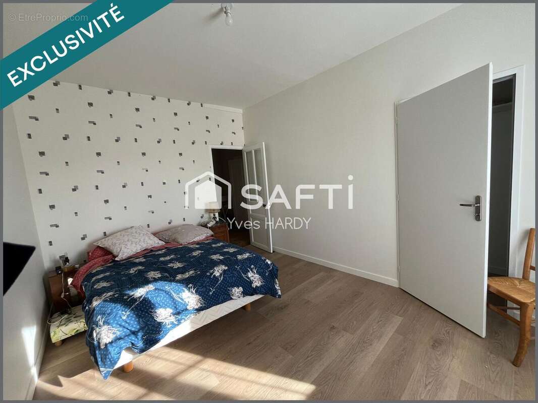 Photo 7 - Maison à LES LANDES-GENUSSON