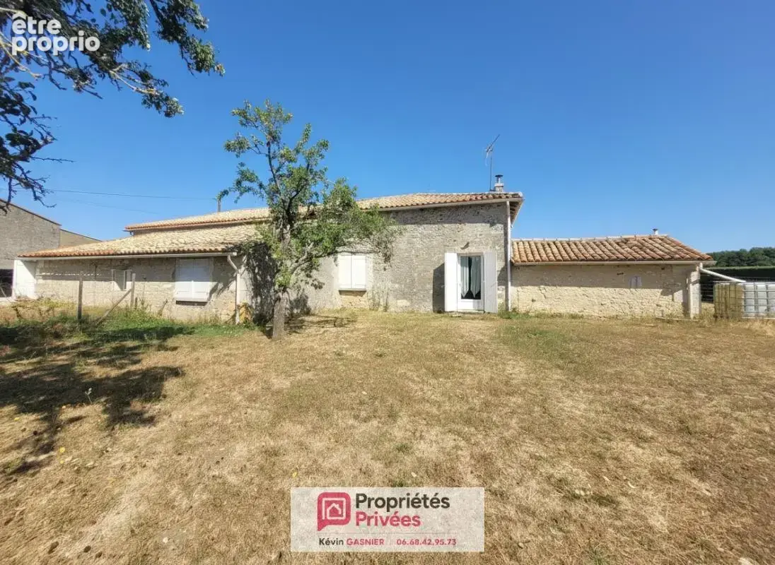 DIGNAC (16410) : Maison en pierre de 76m2 avec grange et atelier - photo 2