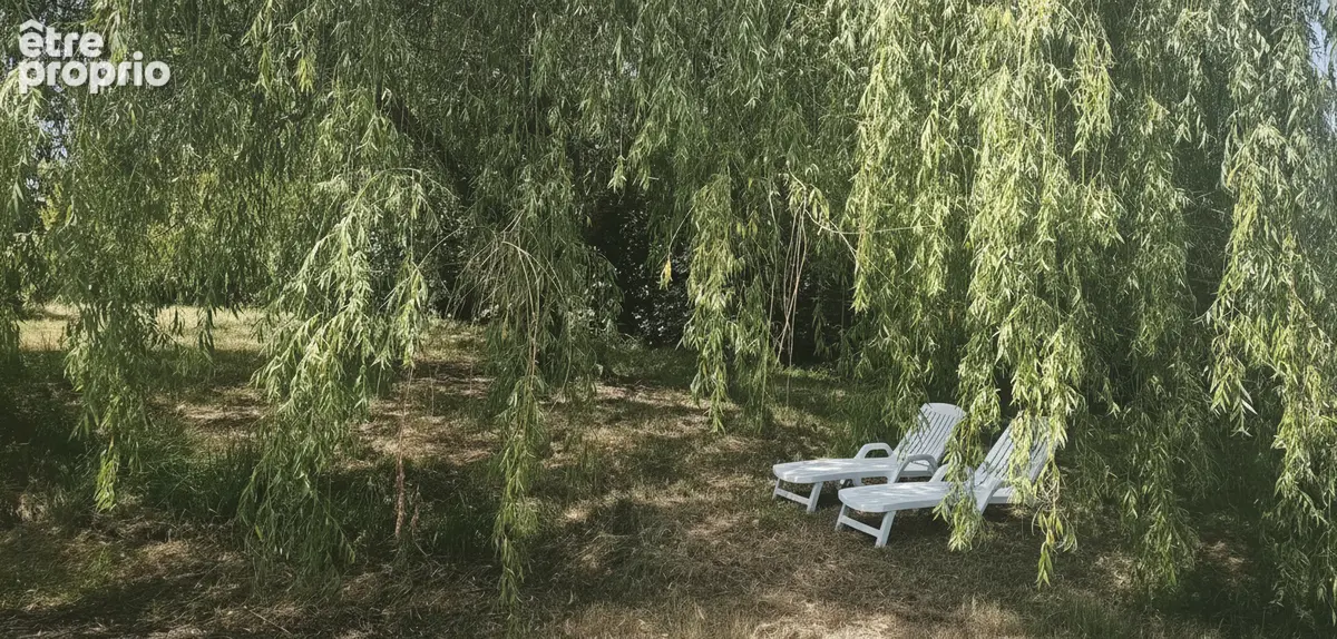 Maison individuelle récente avec garage et magnifique terrain arboré de 3000 m² - photo 4